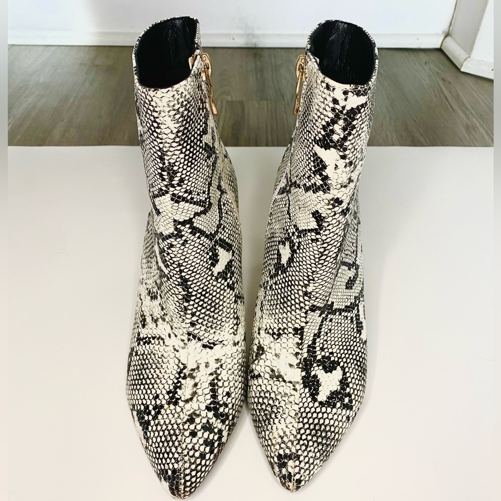 3 inch Amazon brand snake skin booties in size 7.5.